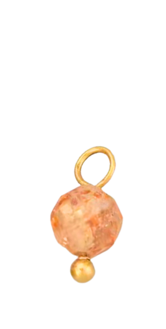 Light orange bead in gold
